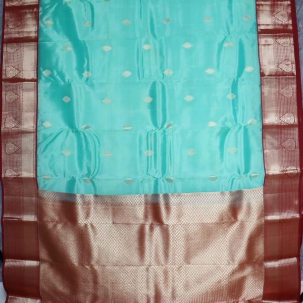 Sea Green Kanchipuram Silk Saree With Allover Zari Buttis and Zari Border